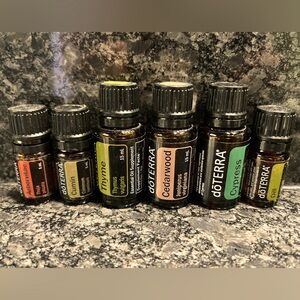 Doterra Oils - Arborvitae, Cumin, Thyme, Cedarwood, Cypress, Dill.